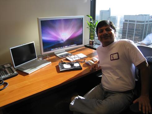 Ashish Jain with a Mac and an Information Card shirt